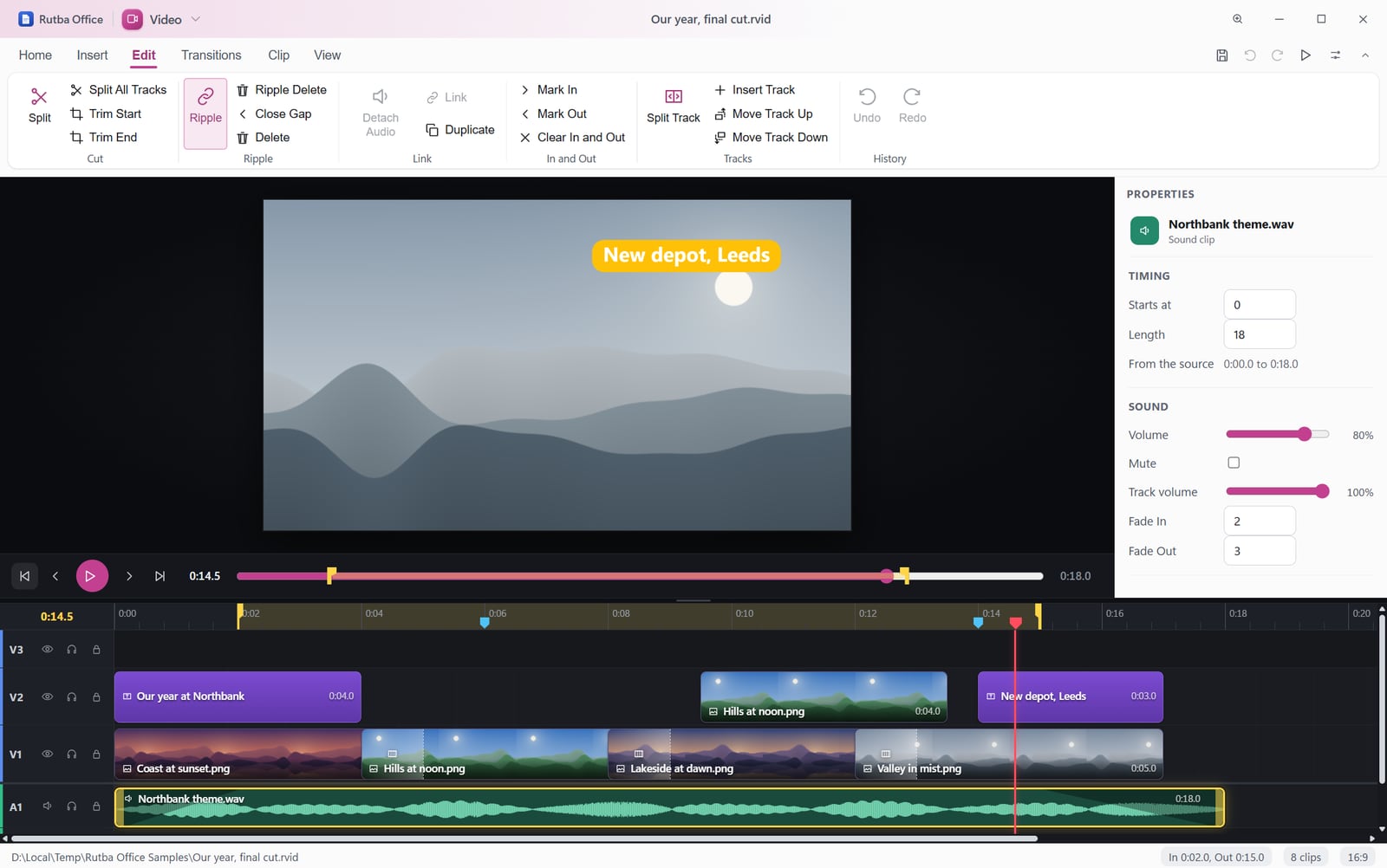 The Video app on the Edit tab, with Mark In, Mark Out, Split Track, Insert Track and Move Track buttons, a callout over a misty valley on the preview, the stretch from 0:02 to 0:15 marked on the timeline, and a music track picked with its waveform, its volume at 80% and fades of 2 and 3 seconds in the panel